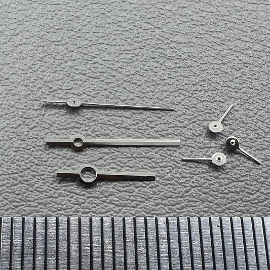 Silver watch hands set for Ronda 5030.D quartz movement, precision timepiece parts.