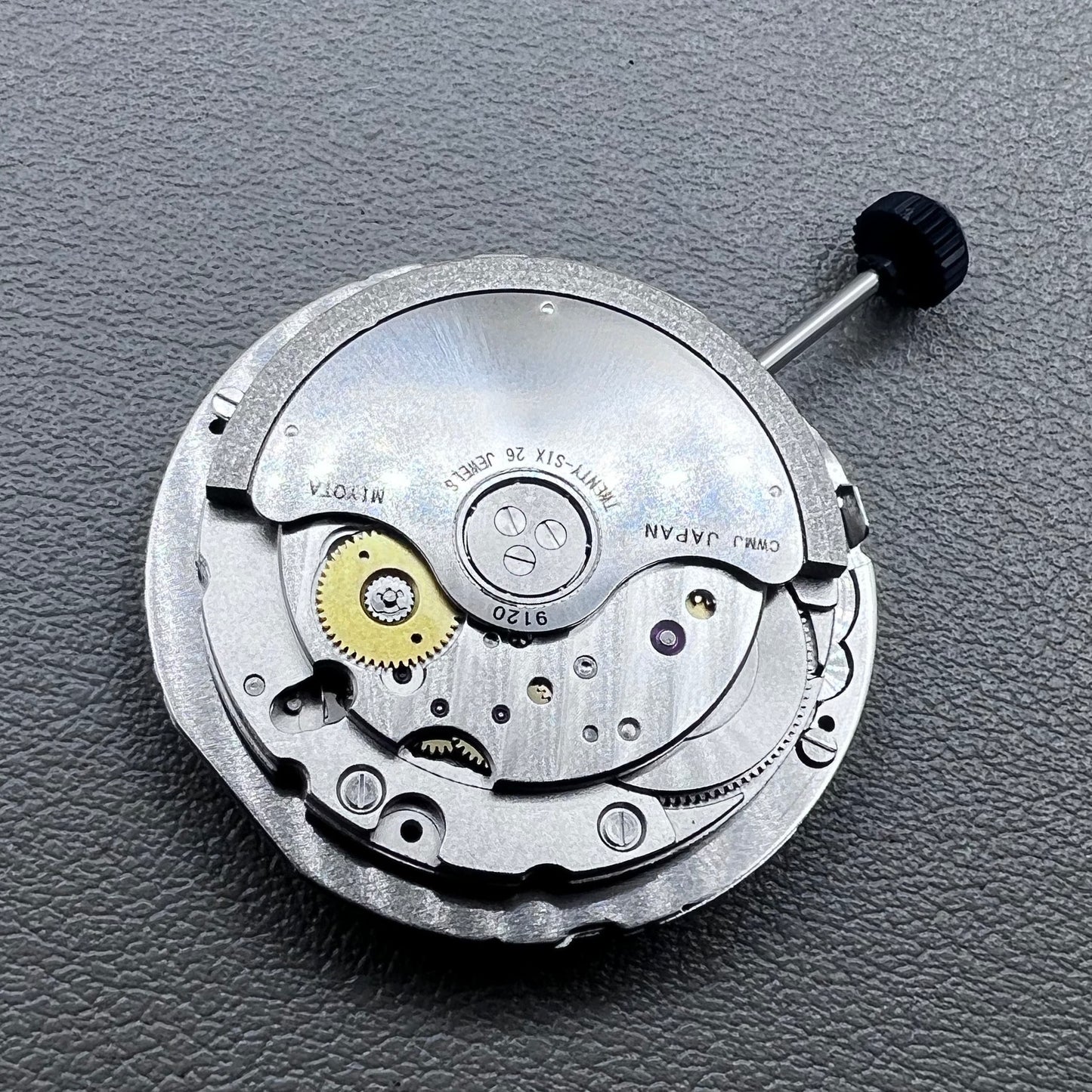 Close-up of Japan Miyota 9120 automatic mechanical watch movement showcasing precision craftsmanship.
