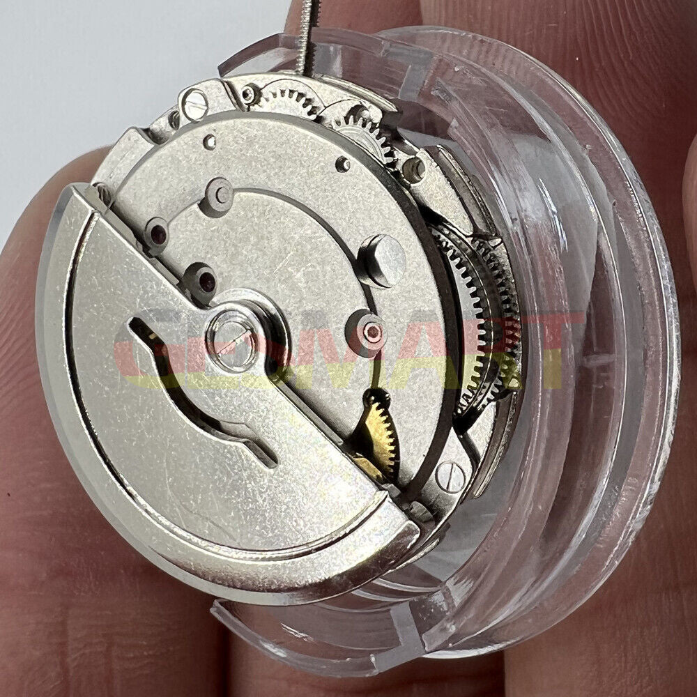 Dandong Silver automatic mechanical watch movement with second stop, precision craftsmanship for watch repairs.