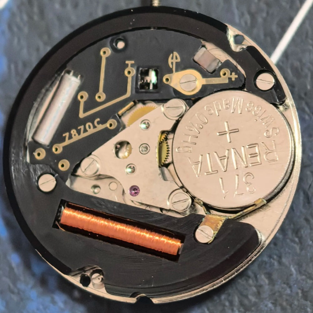 Swiss Made ETA7870 quartz movement with 5 hands, premium watch part for precise timekeeping and durable repairs.