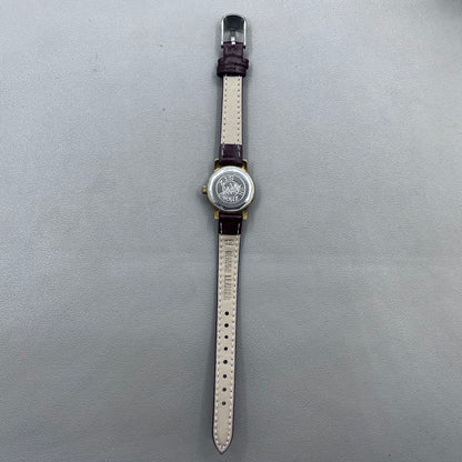 Dark Brown Strap Round Case 3 Hands Purple Background Manual Mechanical Watch