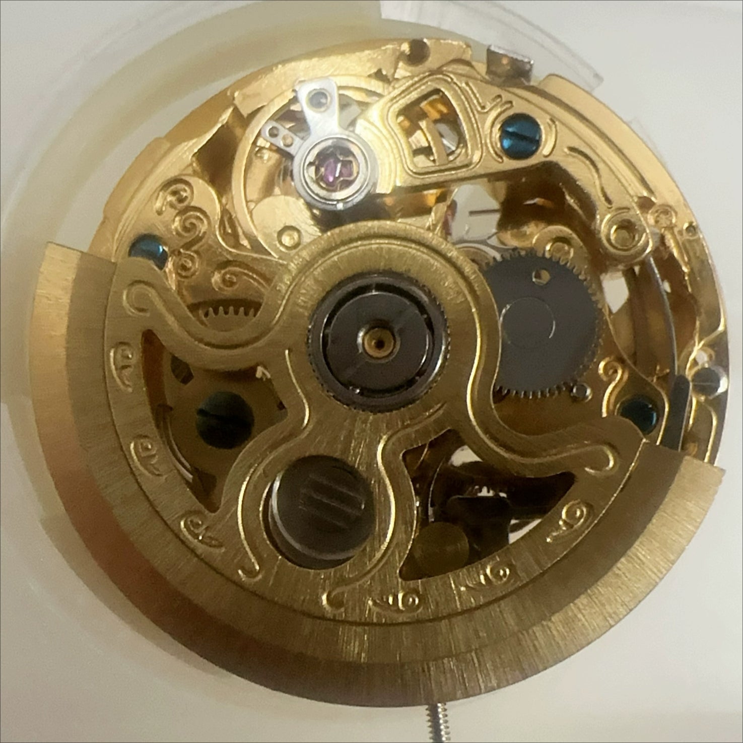 China Hangzhou 2189 automatic mechanical watch movement with 7 hands, hollow golden design for watch accessories.