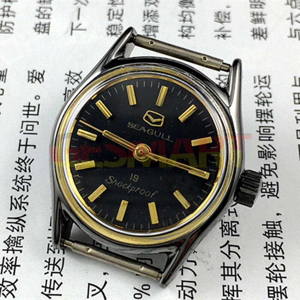 Black Seagull ladies watch case with golden nail markers, manual mechanical movement, shock-resistant design.