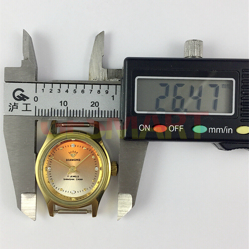 Shanghai Diamond 25mm lady watch with orange oval dial, manual mechanical movement, 17 jewels, elegant design.