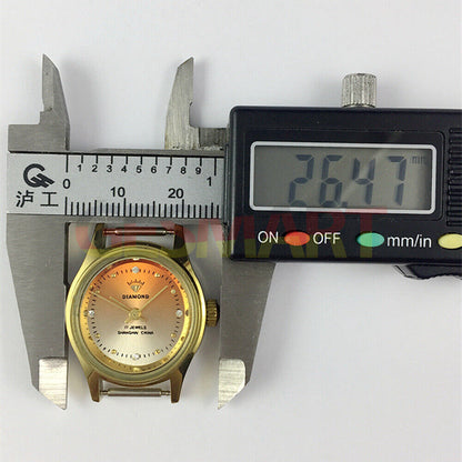 Shanghai Diamond 25mm lady watch with orange oval dial, manual mechanical movement, 17 jewels, elegant design.