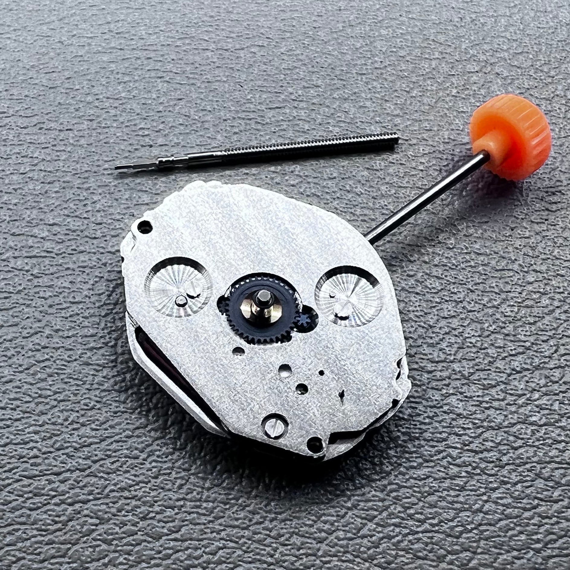 Japan Miyota 1L45 quartz movement with small second hand, precise watch accessory for repair and customization.
