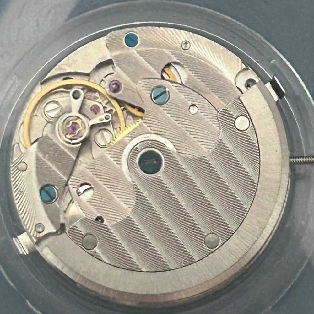 China Made Tianjin Seagull TY2711 mechanical watch movement with intricately carved rotor for precise timekeeping.