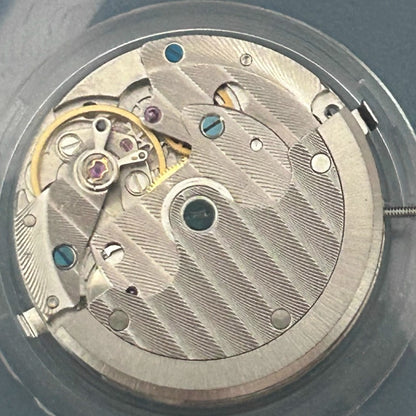 China Made Tianjin Seagull TY2711 mechanical watch movement with intricately carved rotor for precise timekeeping.