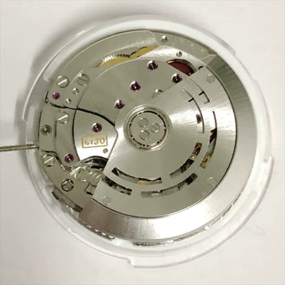 Shanghai 4130 automatic watch with small seconds at 3, 6, 9 o'clock, precision China-made timepiece.