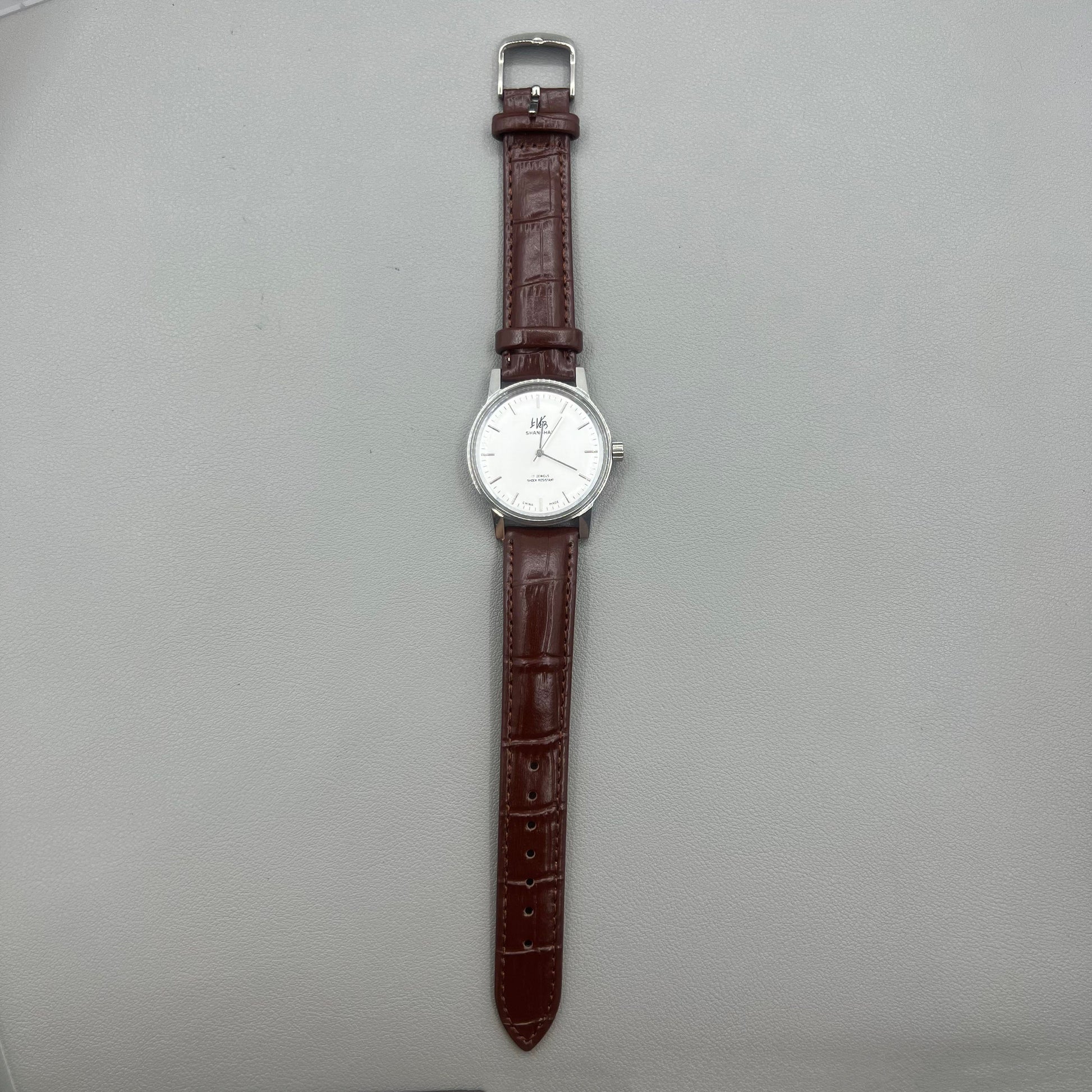 Shanghai 8120 mechanische Herrenuhr mit braunem Lederarmband, 36mm Geh�use, 17 Steinen, wei�em Zifferblatt