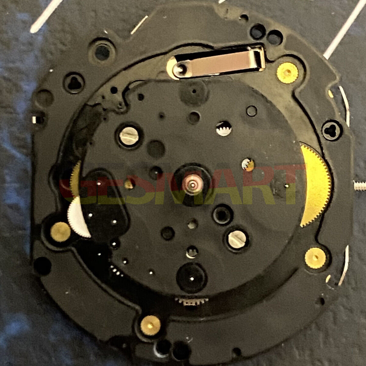 Hattori Epson TMI VD54 quartz watch movement replacement part for precise timekeeping.