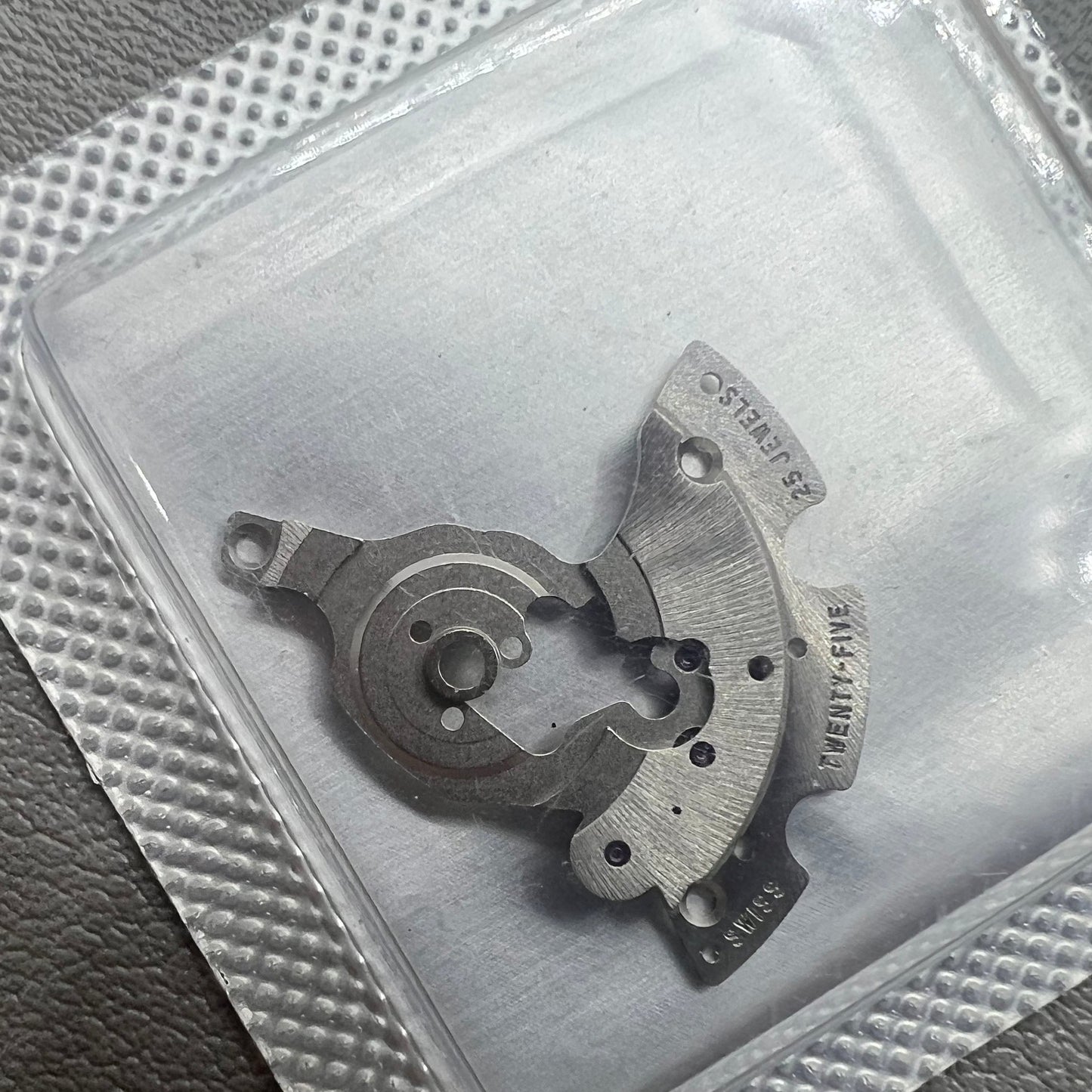 Original SW300-1134 automatic watch movement bridge and wheel by Swiss Echte for SW300 caliber.