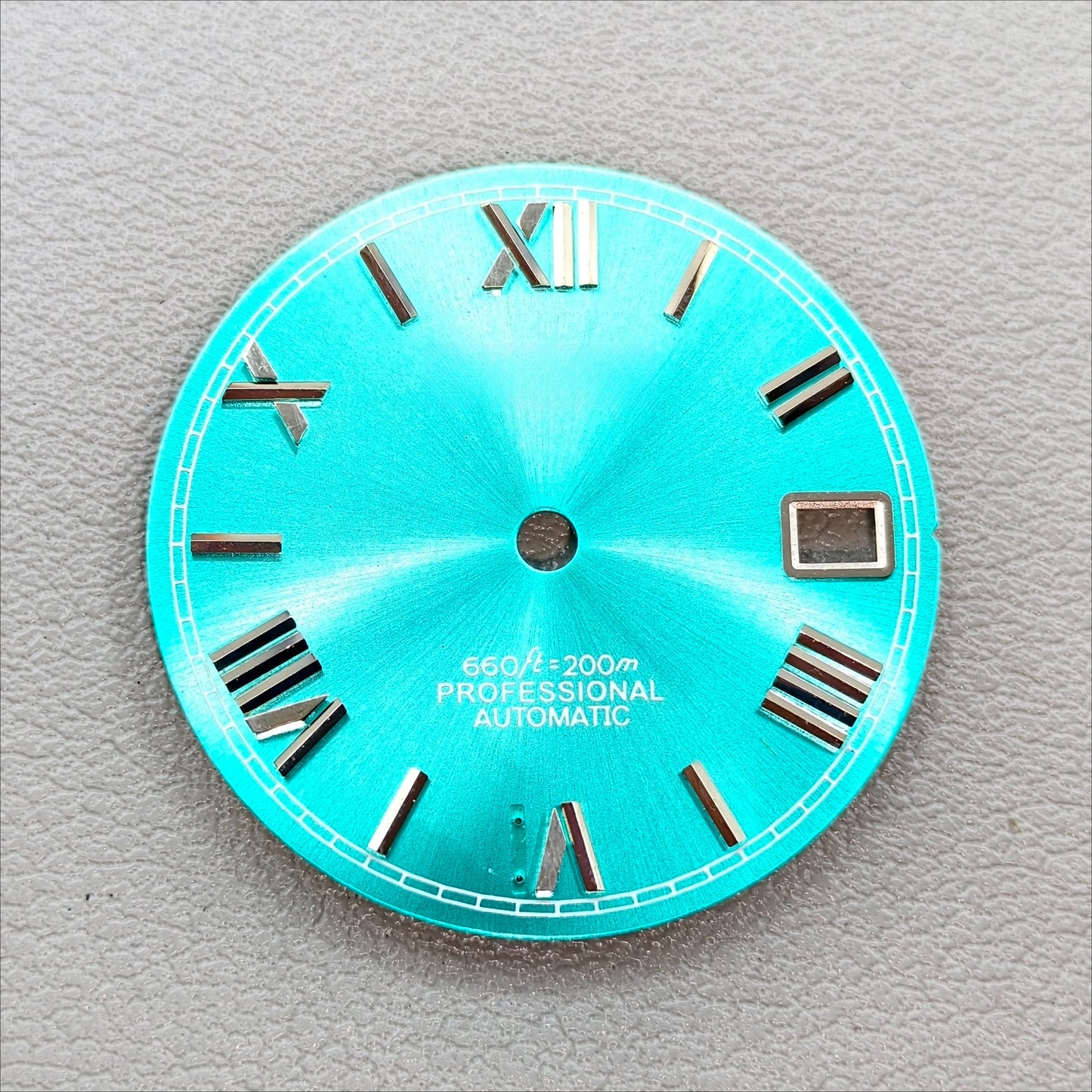 watch dial with S logo