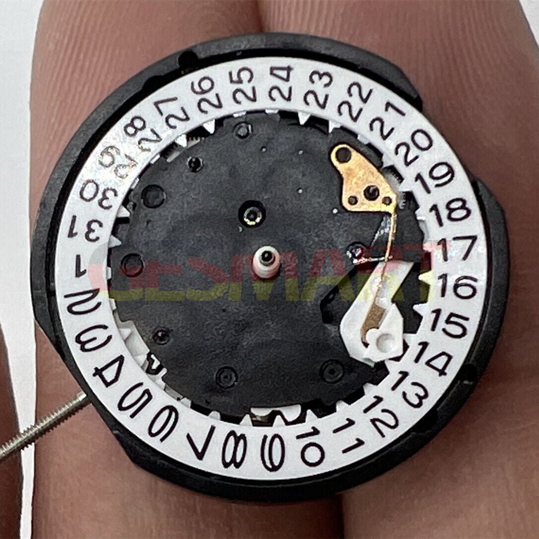 Sunon PE81 quartz watch movement with 3 hands, date at 3, small seconds at 6 and 9 positions.