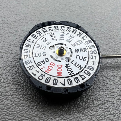 Japan PC23A Quartz watch movement showing 3 hands and double calendar functionality for precise timekeeping.