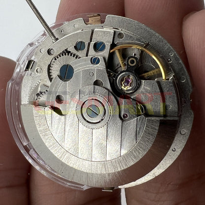 China Made mechanical watch accessory featuring automatic movement and large date display at 12 o'clock.