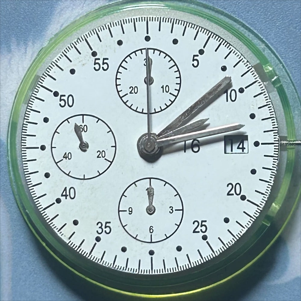 Dandong 7750 mechanical watch movement showing 7 hands with small seconds at 6, 9, and 12 o'clock positions.