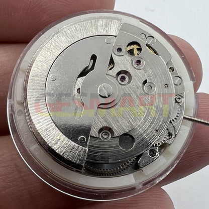 DG2813 automatic mechanical watch movement with day-date function, silver finish for precise replacements.
