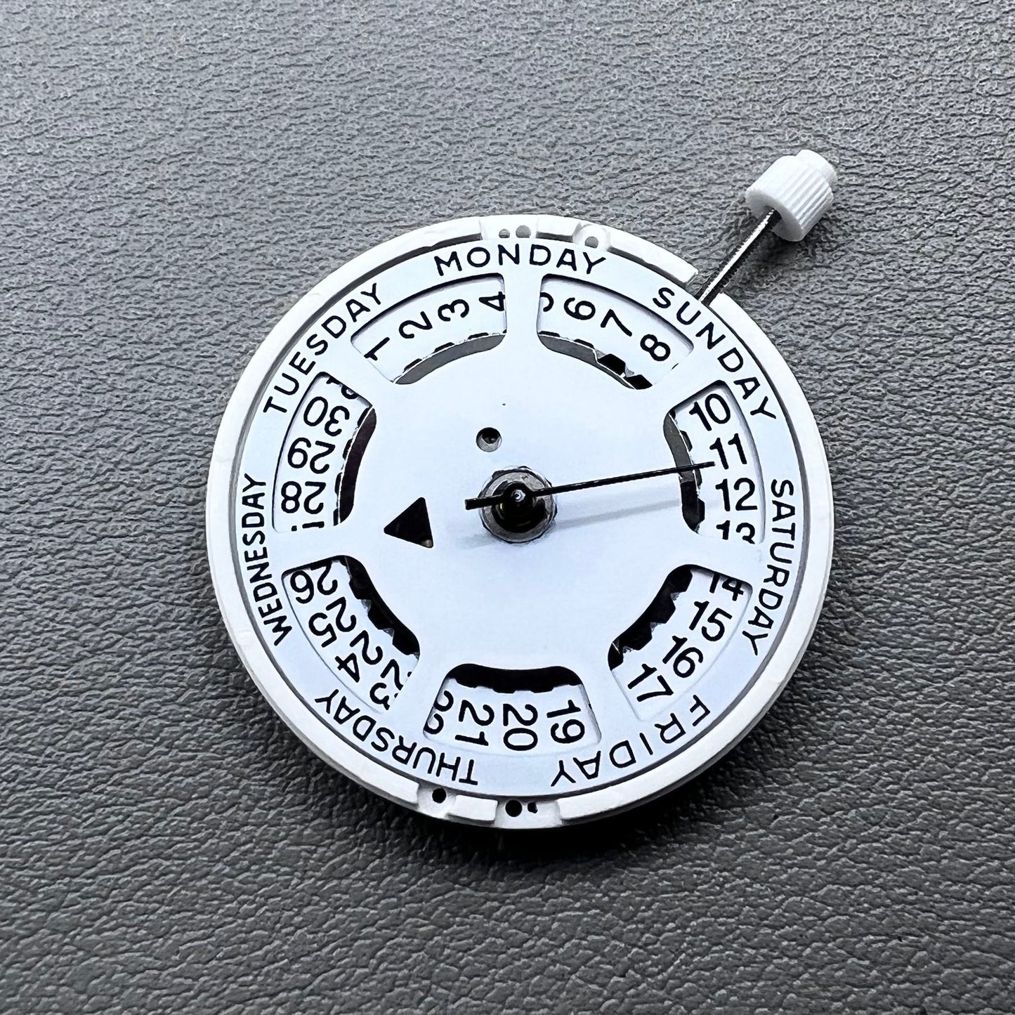 Swiss ISA 1198 watch movement with day-date feature, white dial, date at 3 o?clock.