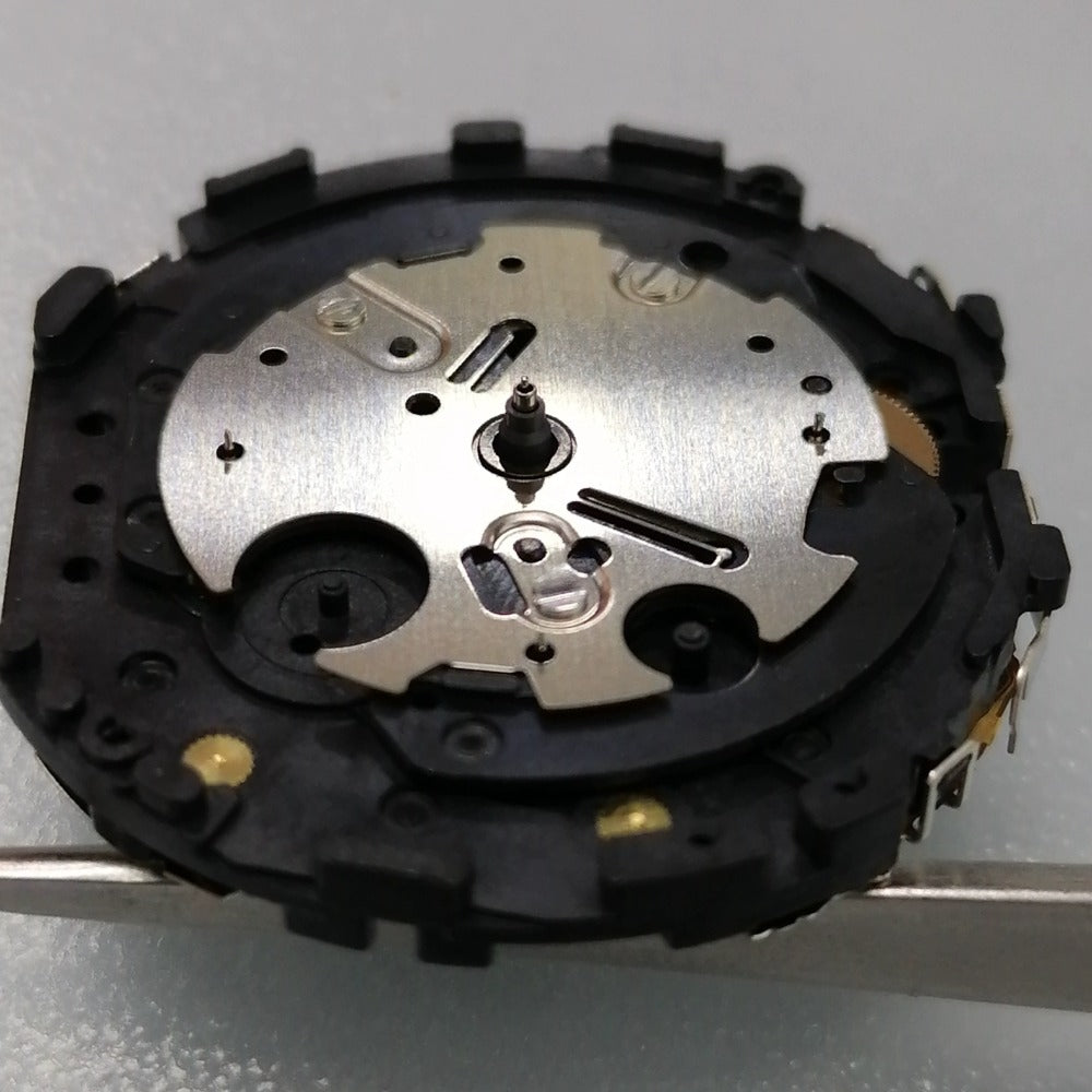 Japan Made VR31 quartz watch movement with small second subdials at 3, 6, and 9 o'clock positions, ideal for precise repairs.
