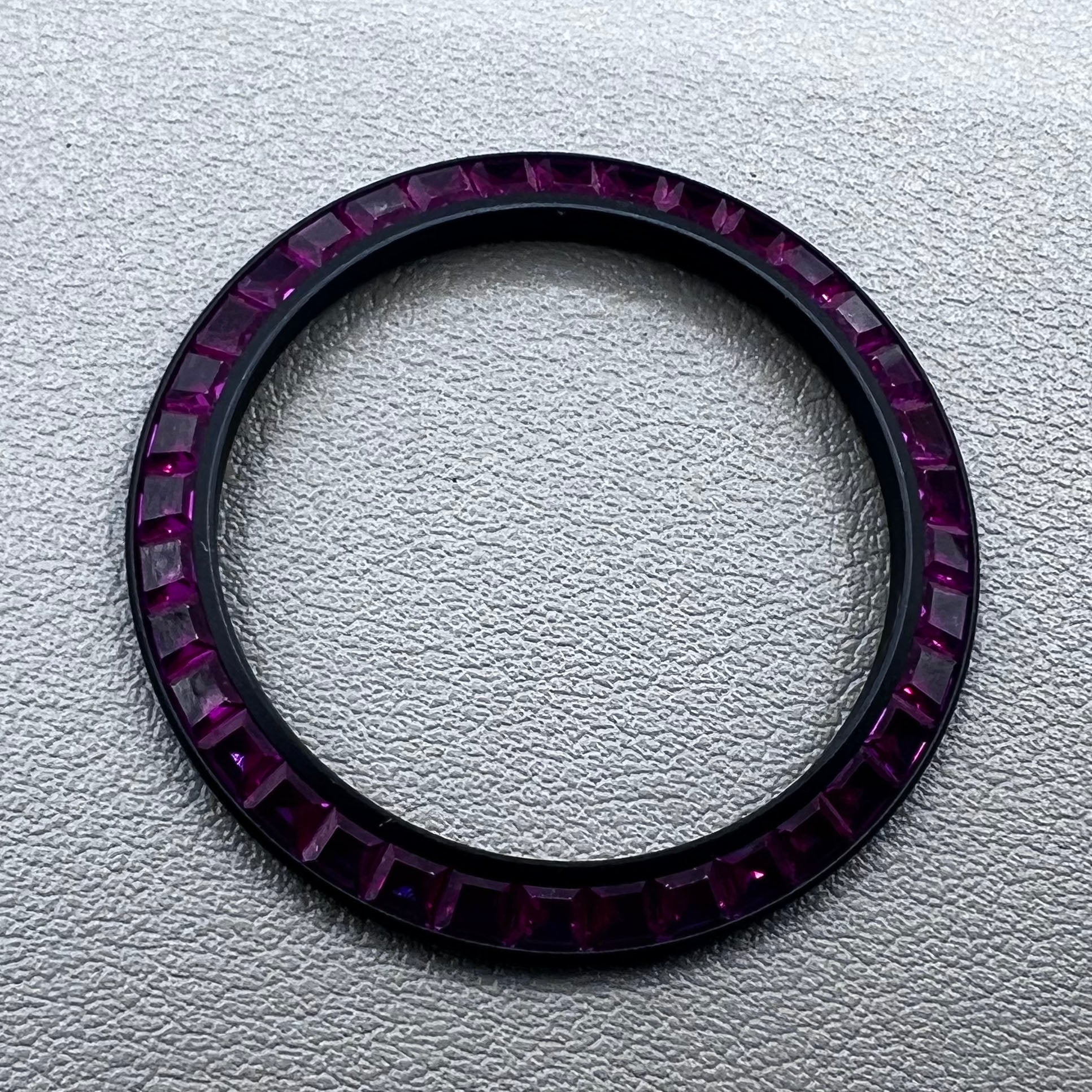 Purple T-shaped square Moissanite bezel for Daytona watch, inclined design enhancing luxury style.