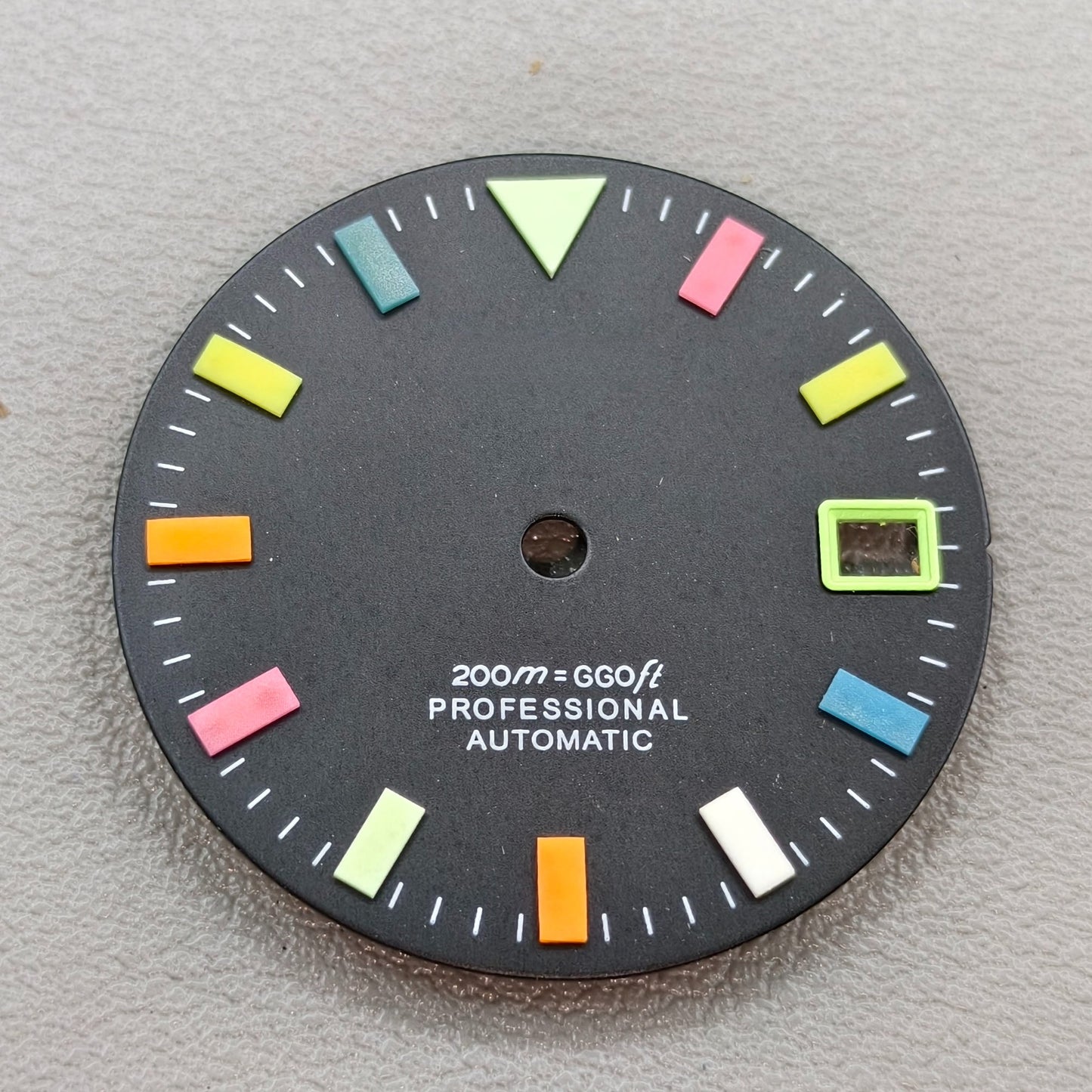 watch dial with S logo