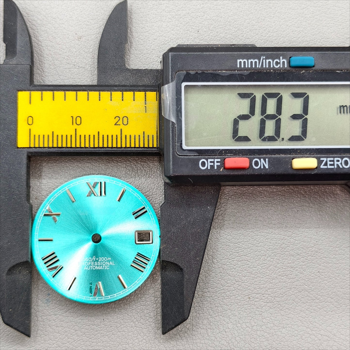 watch dial with S logo