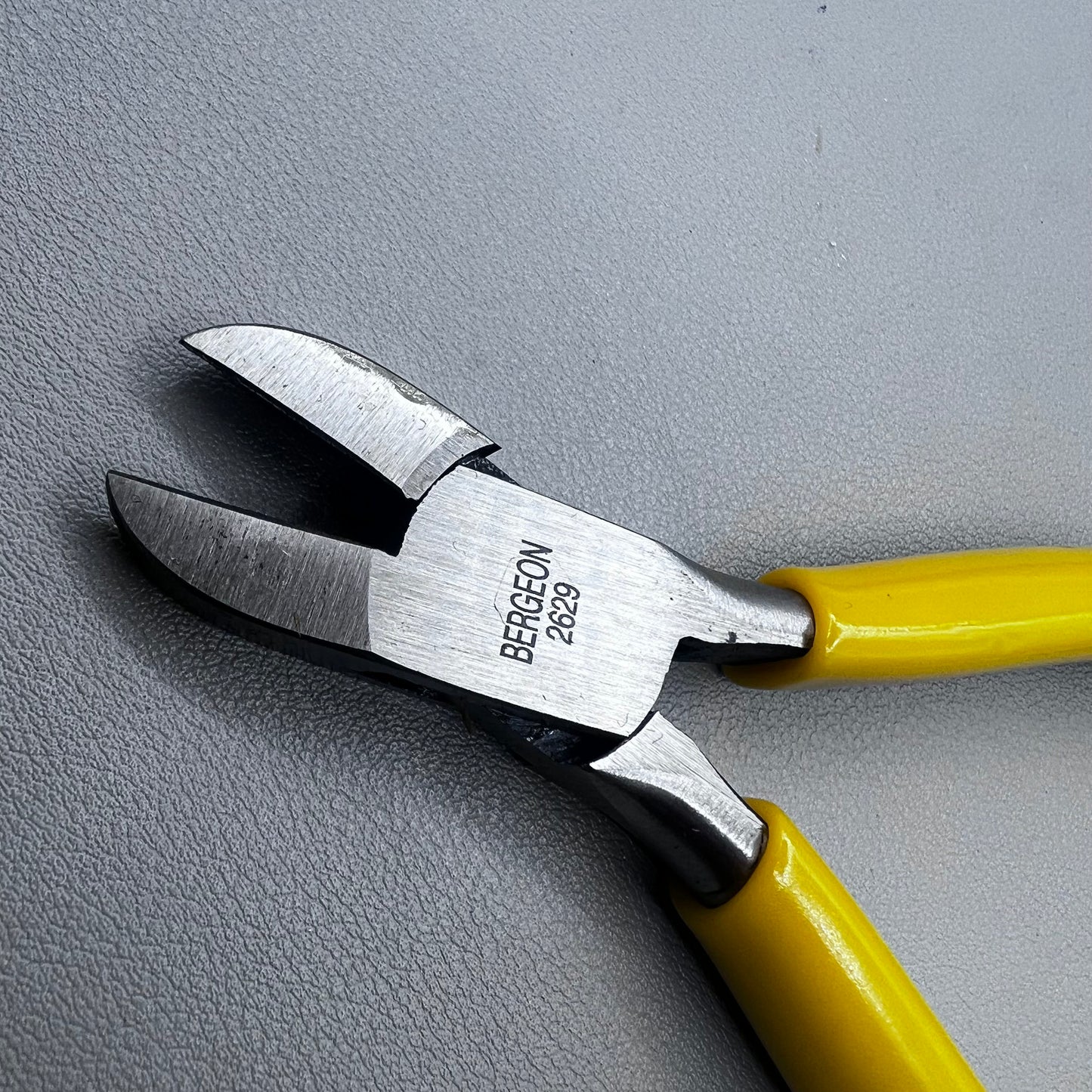 Swiss Bergeon 2629 side cutters pliers with rounded tip, 130mm precision tool for watchband adjustments.