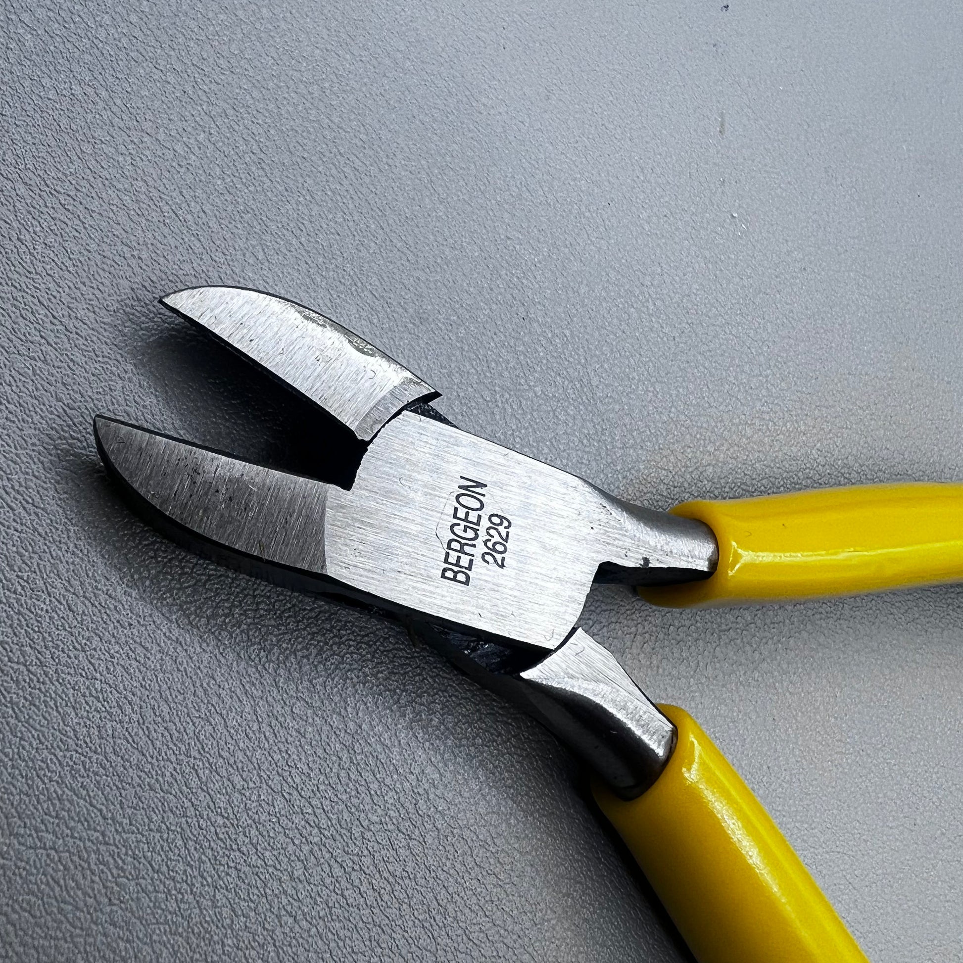 Swiss Bergeon 2629 side cutters pliers with rounded tip, 130mm precision tool for watchband adjustments.