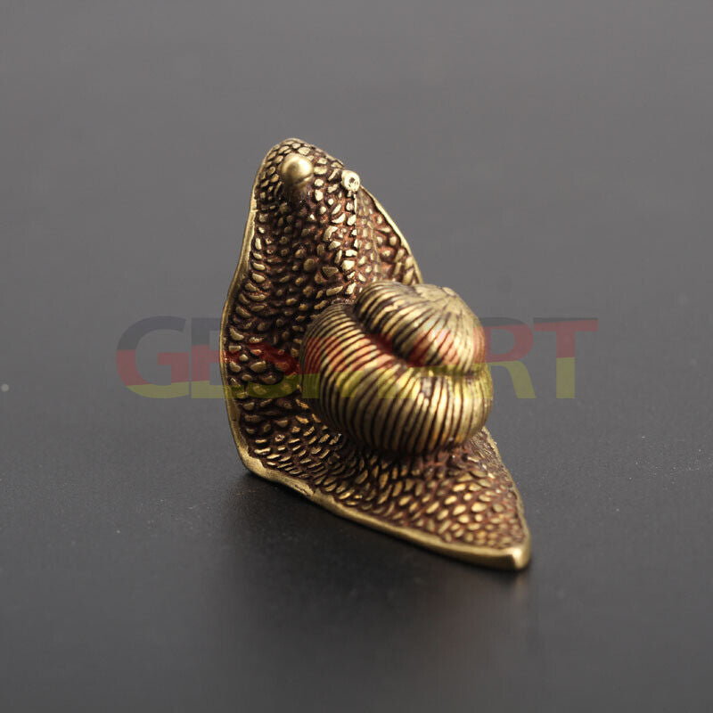 Hand-carved solid copper snail figurine, vintage bronze finish, perfect for watch accessory display.