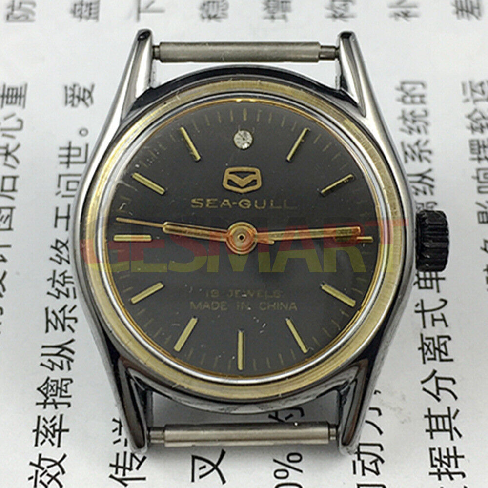 26mm round black ladies watch with gold markers by Seagull, manual mechanical movement for elegant wear.