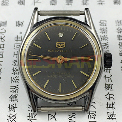 26mm round black ladies watch with gold markers by Seagull, manual mechanical movement for elegant wear.