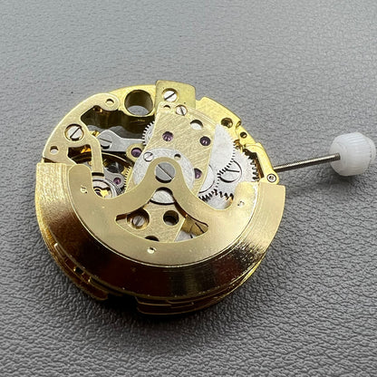 Golden 26.5mm hollow carved watch accessory with automatic 7120 mechanical movement, precision-engineered.