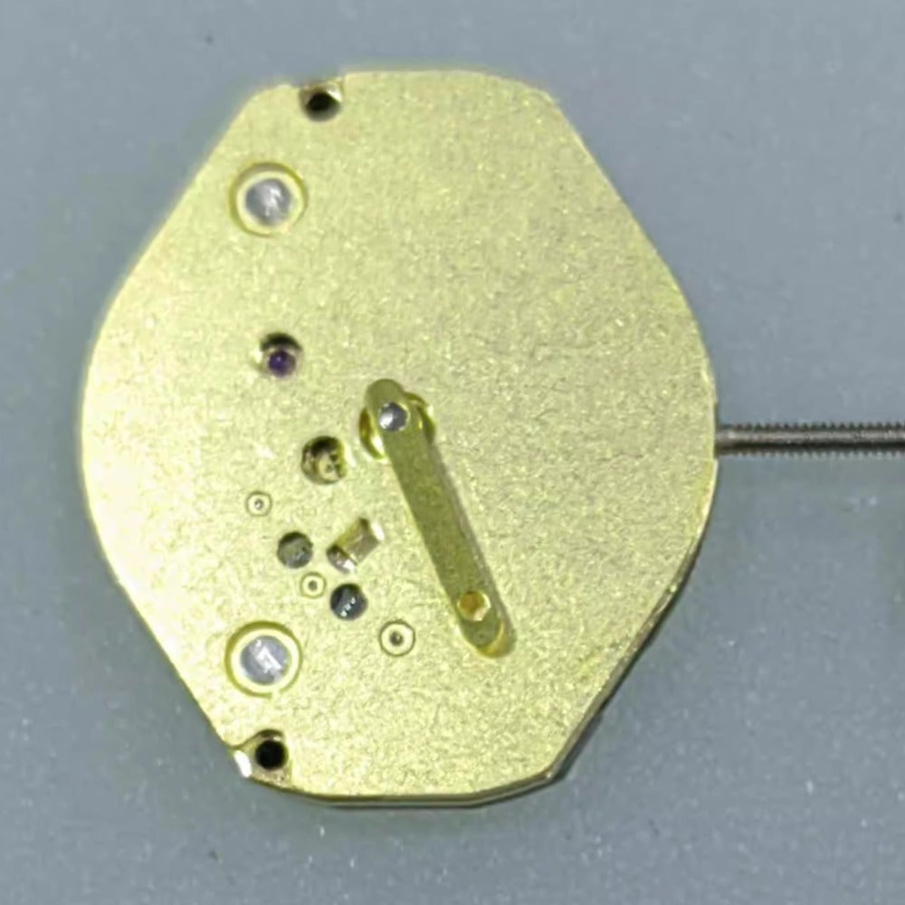 Swiss Made ETA 902.501 golden quartz watch movement for precise timekeeping in luxury watch repairs.