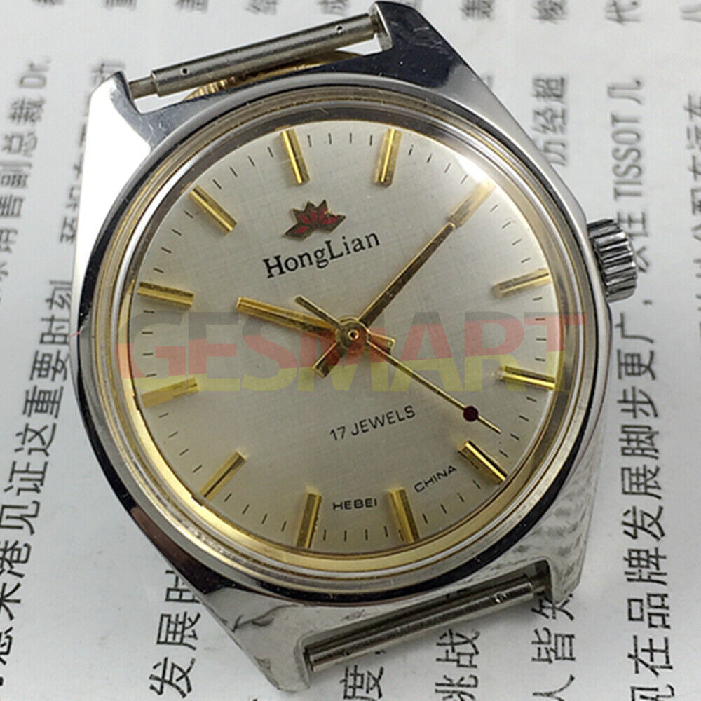 HONGLIAN 32mm manual mechanical watch with 17 jewels, golden nail markers, and grey dial.