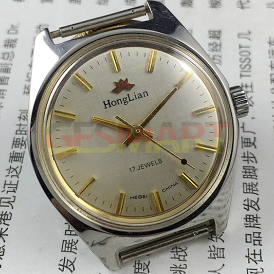 HONGLIAN 32mm manual mechanical watch with 17 jewels, golden nail markers, and grey dial.
