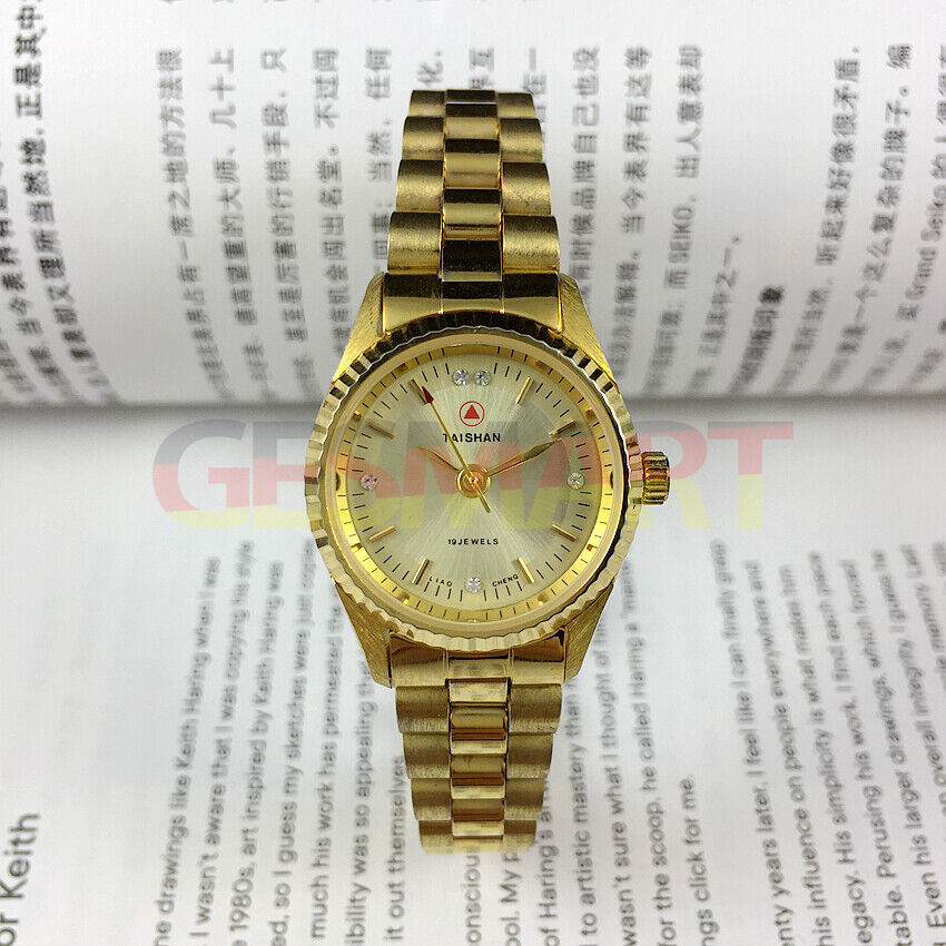 Elegant 27mm TAISHAN manual mechanical lady watch with imitation diamond markers, perfect for stylish wear.