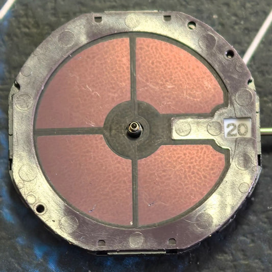 Citizen Eco-Drive E111M quartz watch movement with solar power and date display at 3 o'clock.