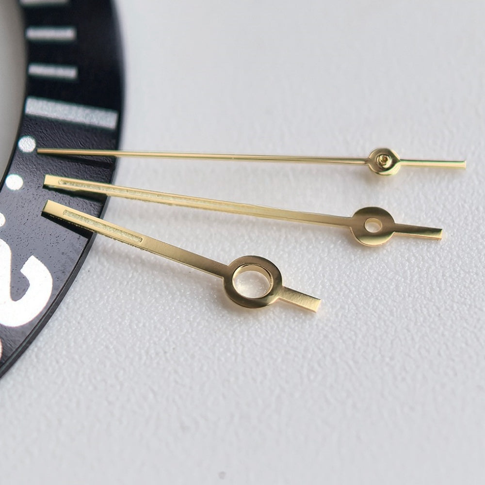 Golden green luminous watch hands designed for Omega 1120 movement, enhancing readability in low light.