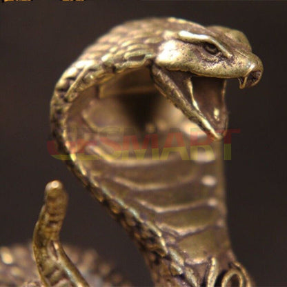 Hand-carved solid copper cobra figurine with bronze finish, detailed collectible trinket.