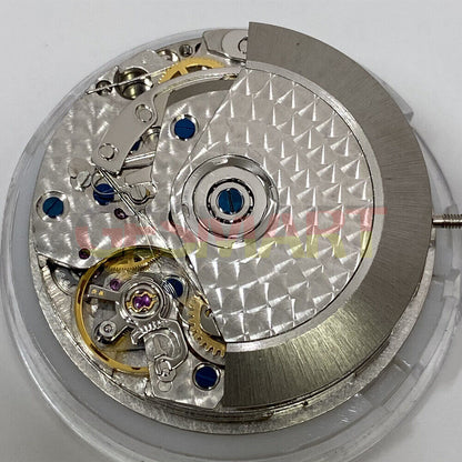Dandong 7753 automatic watch movement with small seconds at 9 o'clock, precision mechanical component for watch repair.