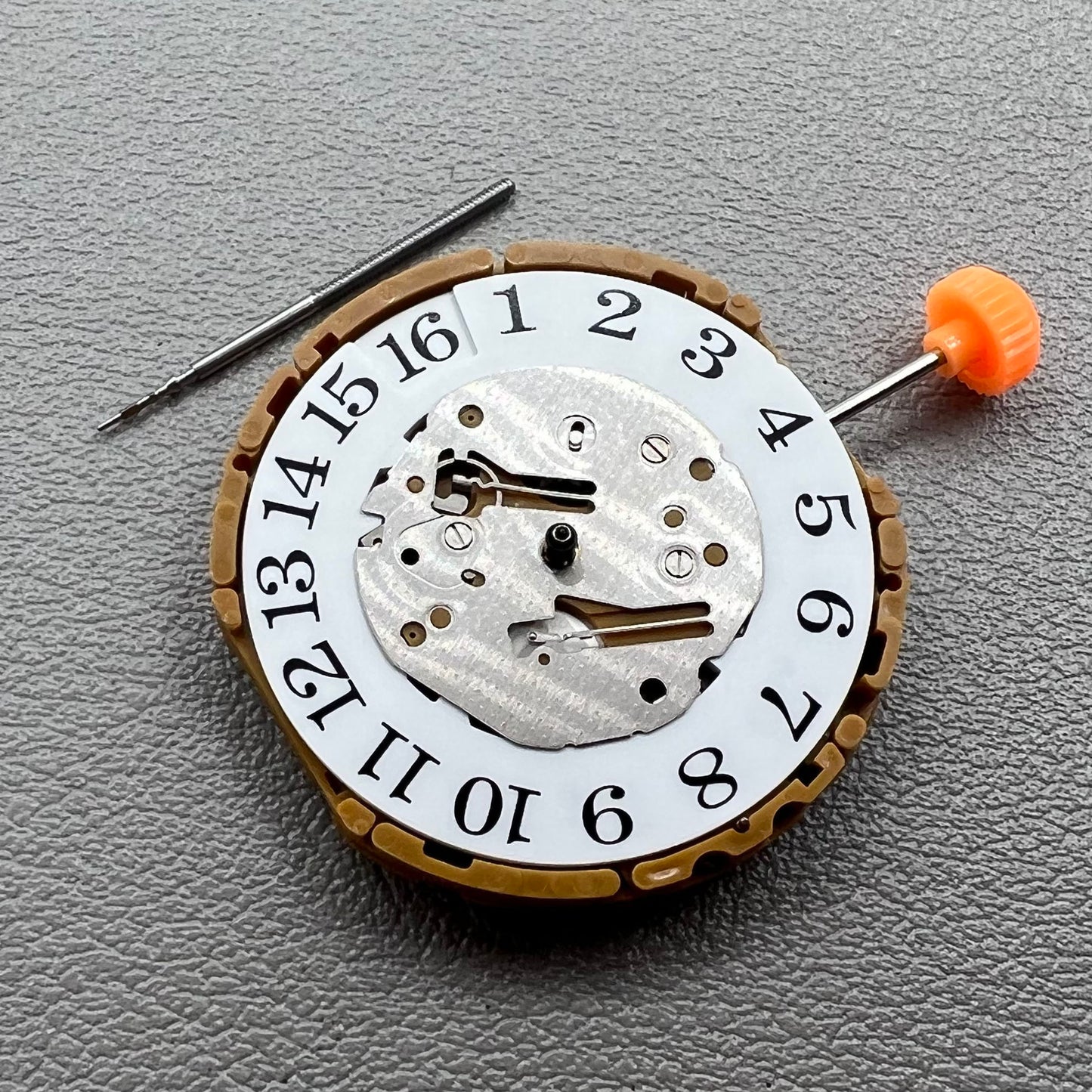 Japan Miyota GP00 quartz watch movement close-up, precision timekeeping mechanism for watches.