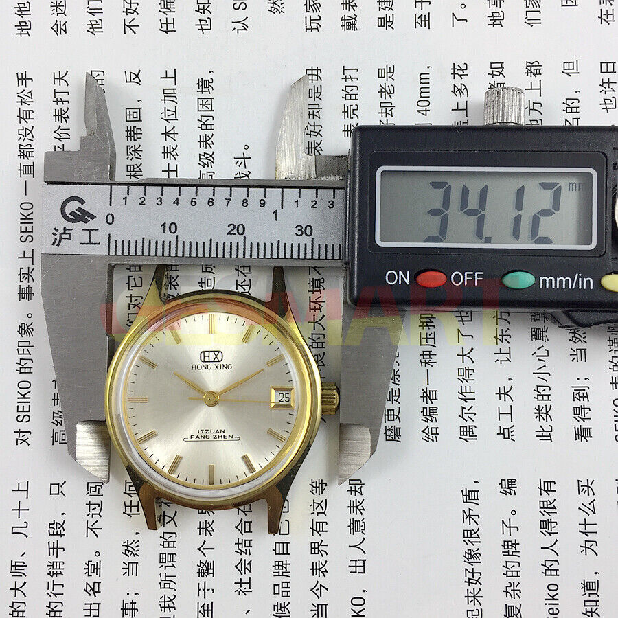 32mm manual mechanical watch by China Made, round case with single calendar and 17 jewels.