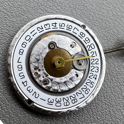 Swiss ETA255.112 quartz movement watch part with single calendar, precision timekeeping by ETA.