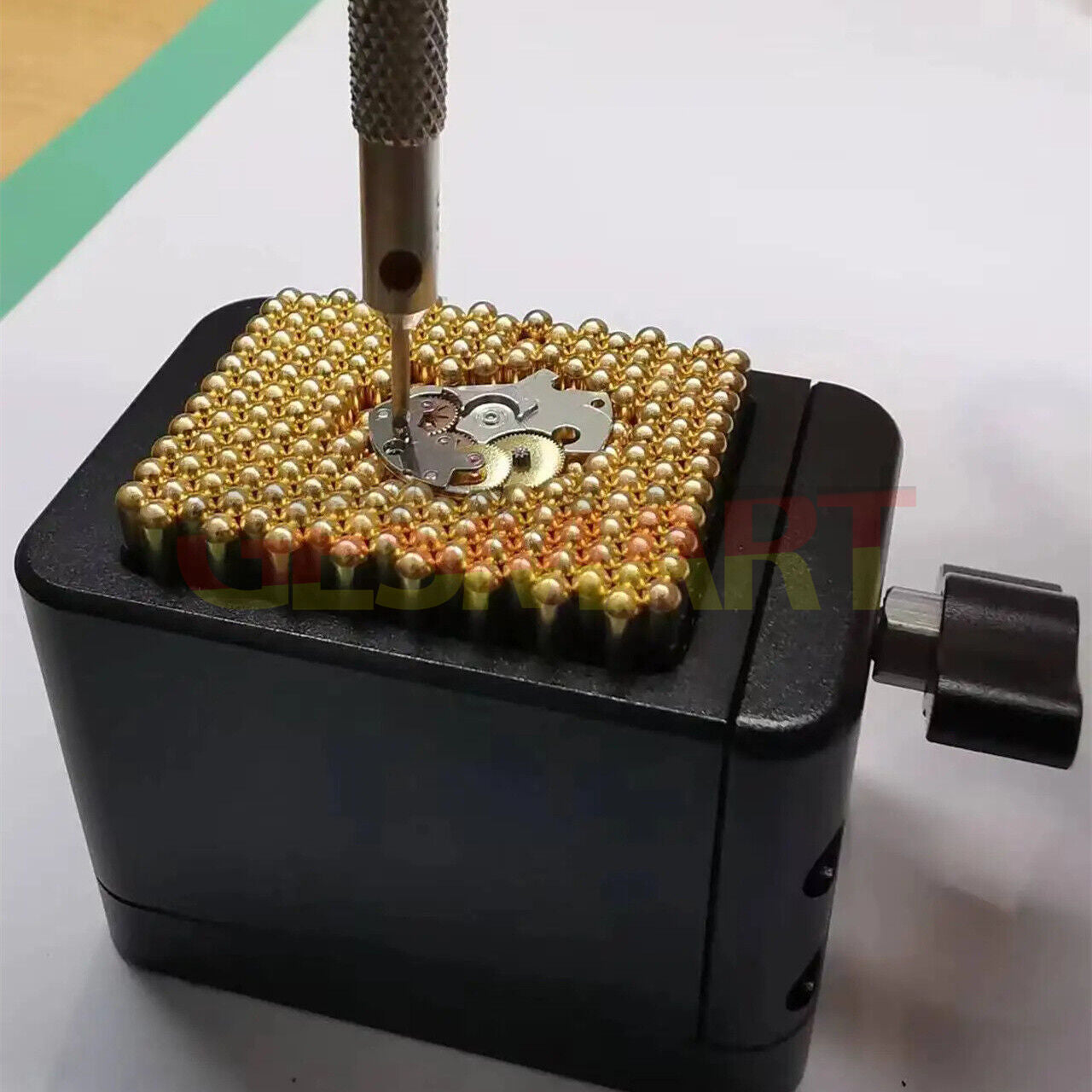 Universal watch movement holder by China Made, compatible with various movement shapes for secure handling.