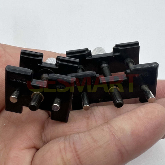 China Made Plastic extensible clamp for watch movement holding, reversible design for secure fit.