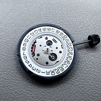 Swiss ETA 804.112 quartz watch movement showing precise 3 hands mechanism for accurate timekeeping.