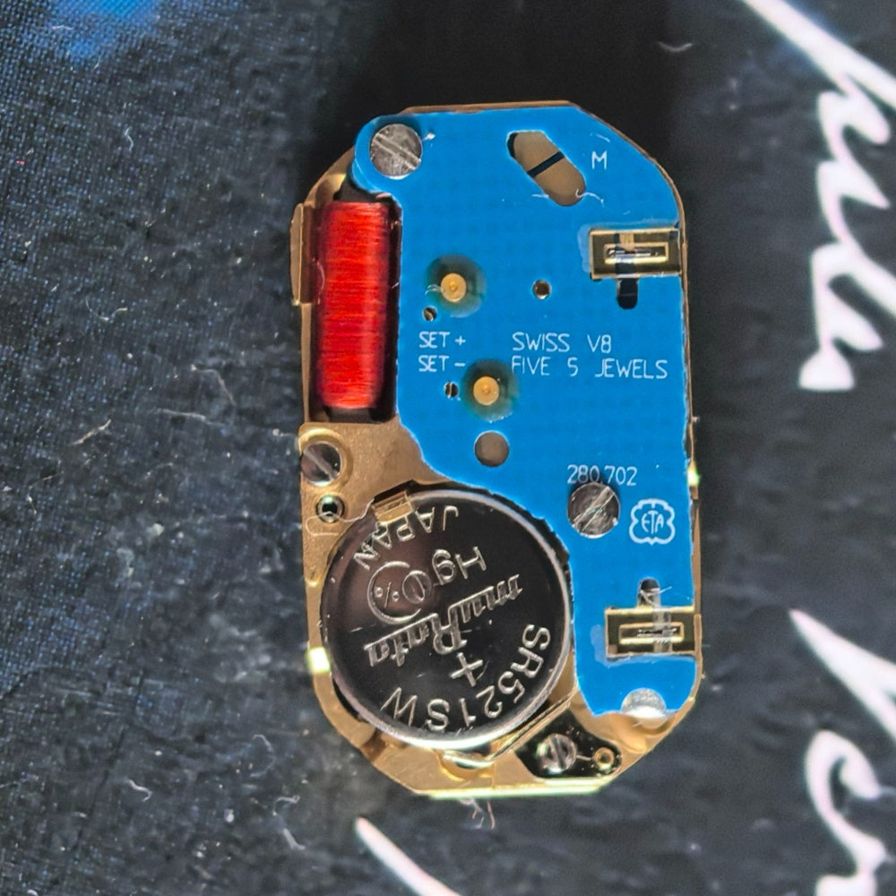 Swiss Made ETA280.702 quartz watch movement close-up for precise timekeeping by ETA.