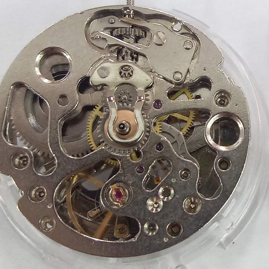 Dandong 7120 silver skeleton watch part with mechanical movement and three hands for repair