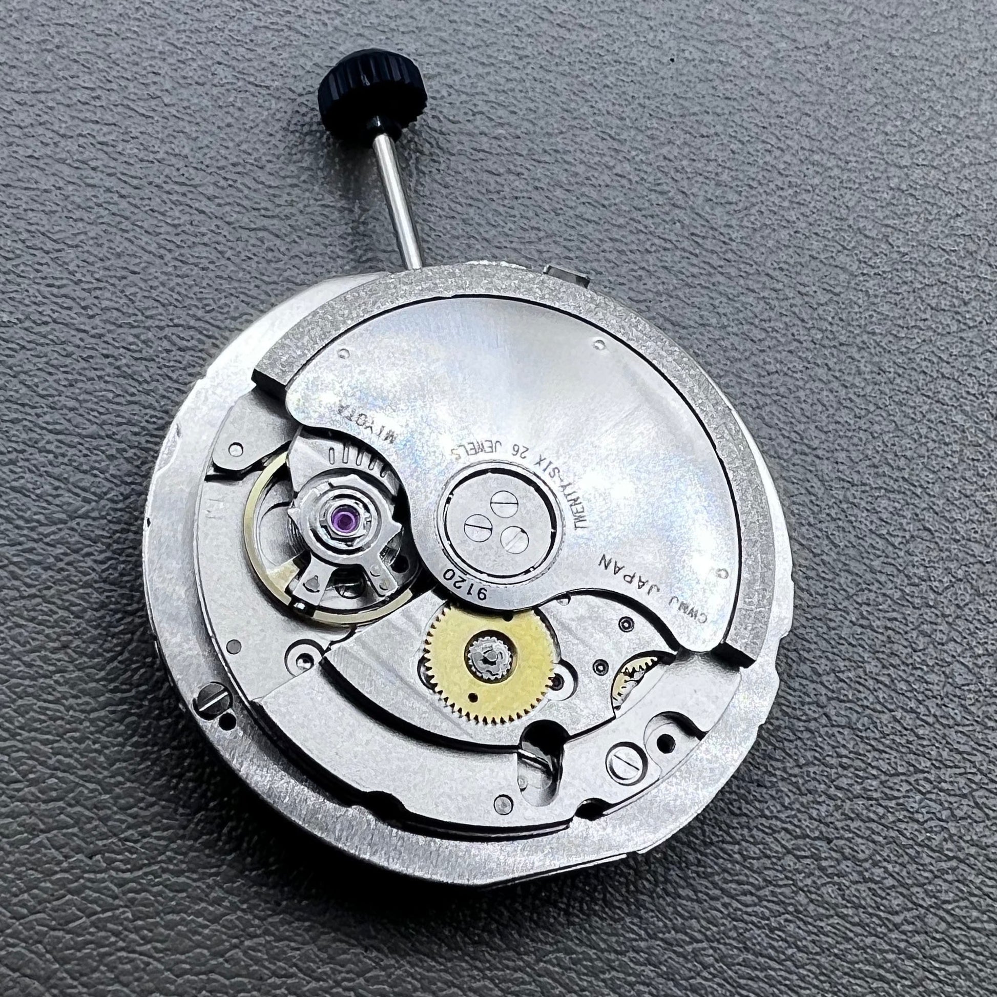 Close-up of Japan Miyota 9120 automatic mechanical watch movement showcasing precision craftsmanship.